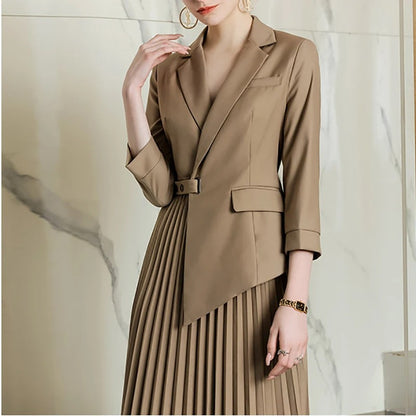 Beige blazer dress with pleated skirt and belt detail