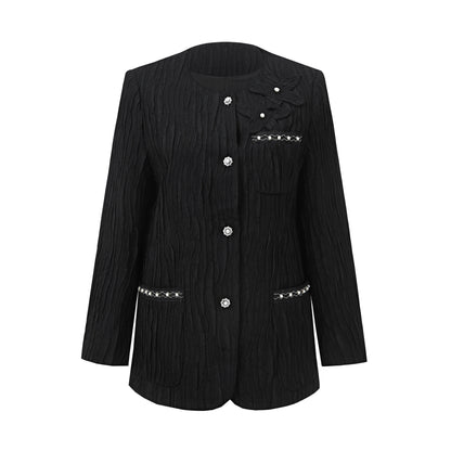 Black textured jacket with round neckline and decorative buttons