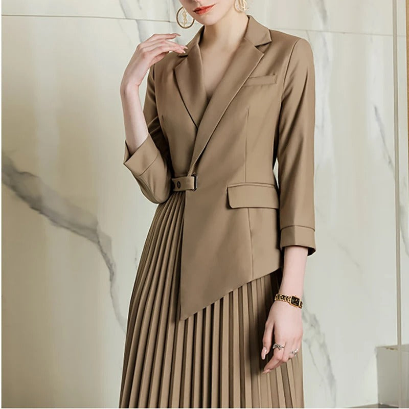 Beige blazer dress with pleated skirt and belt detail
