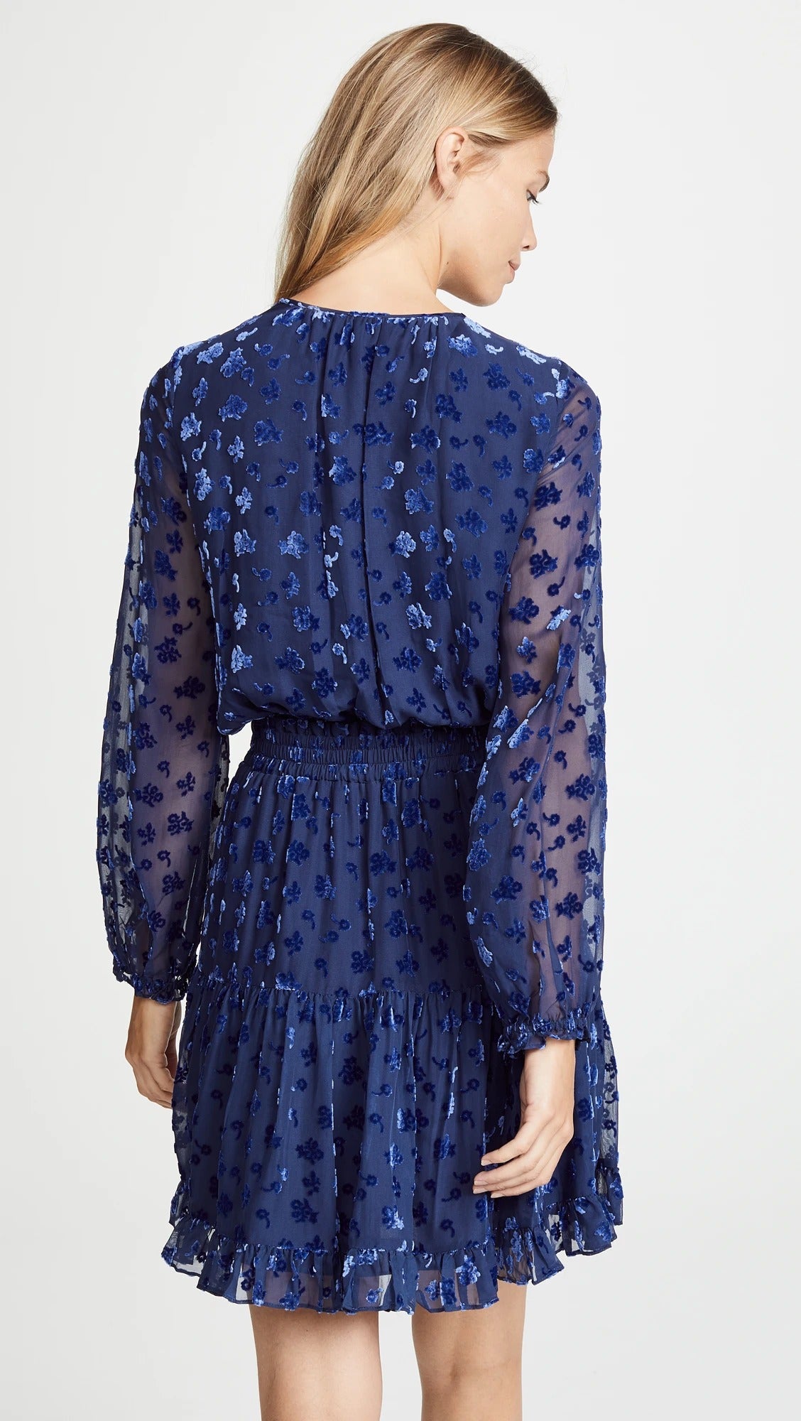 Blue sheer floral dress with long sleeves and tiered skirt